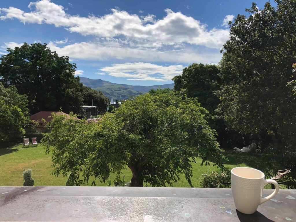 View From Terrace of Akaroa With Trees and Mountains