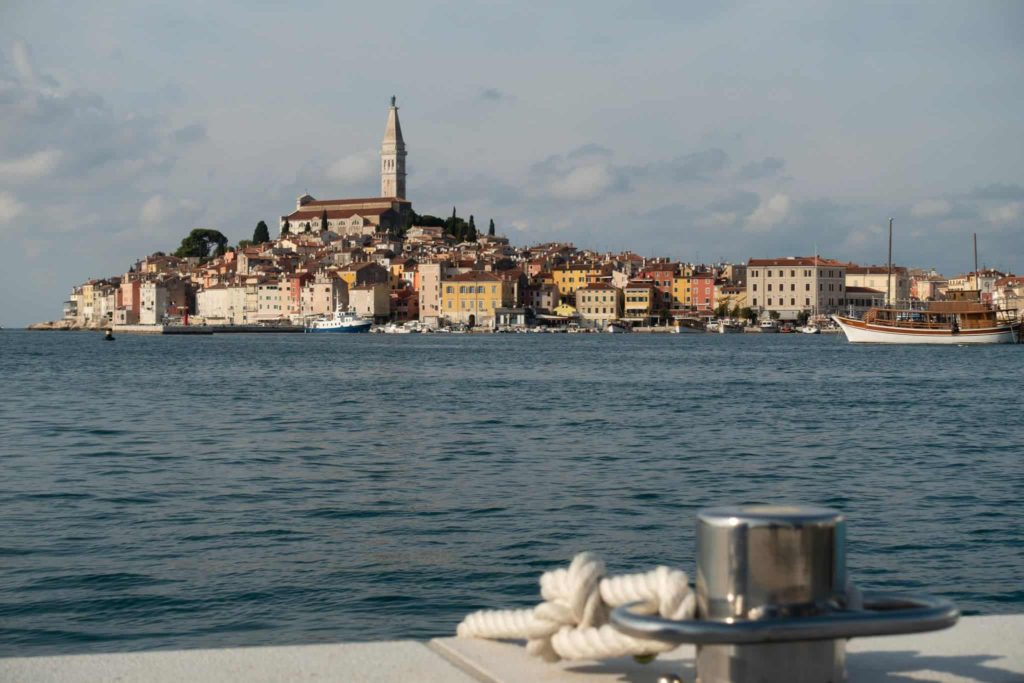 Rovinj’s Scenic Waterfront With a Church.