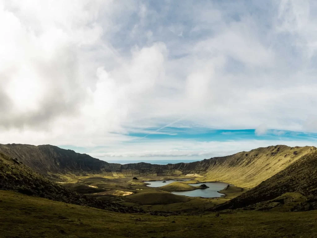 Corvo Is Characterized by a Colossal Volcanic Crater, Known as Caldeirão, Enveloped by Lush Green Hills and Cliffs