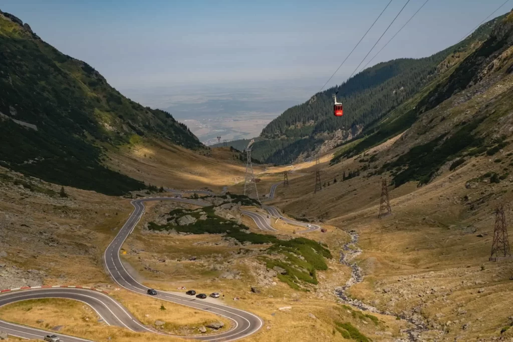 An Aerial Shot of the Winding Transfagarasan Highway as It Carves Through the Fagaras Mountains